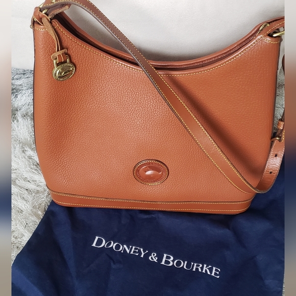 Dooney & Bourke Handbags - 🌻 Spring SALE! 💲Firm📌 Dooney & Bourke: Vintage All Weather Leather Bag